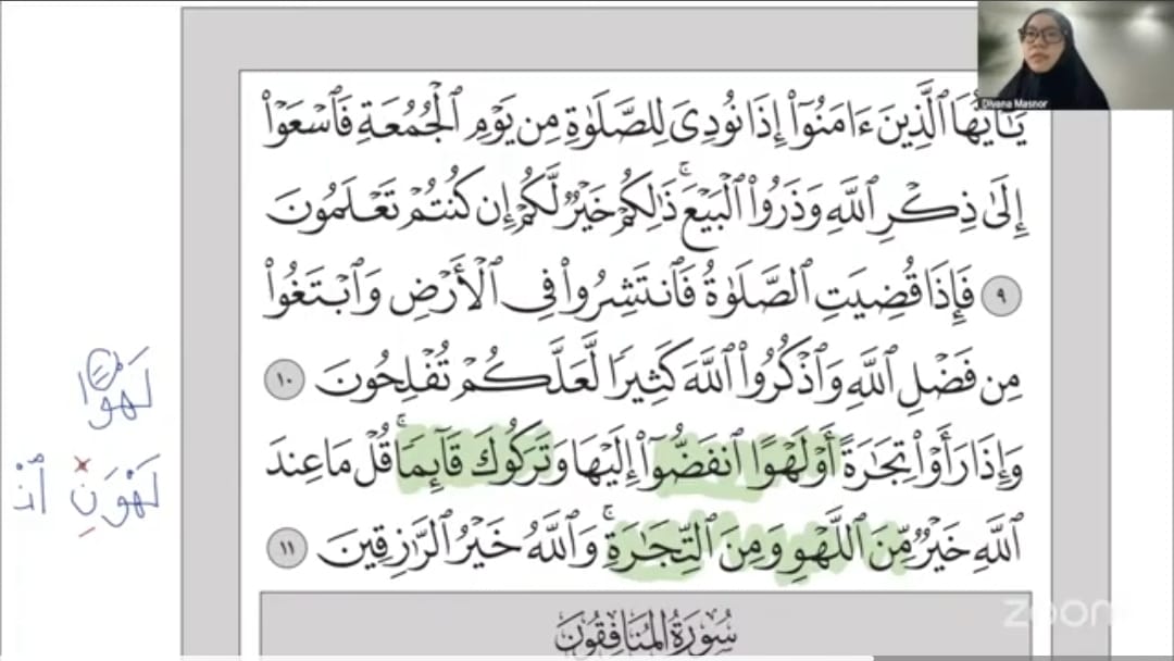 Student reading Surah Al-Jumu'ah with teacher corrections